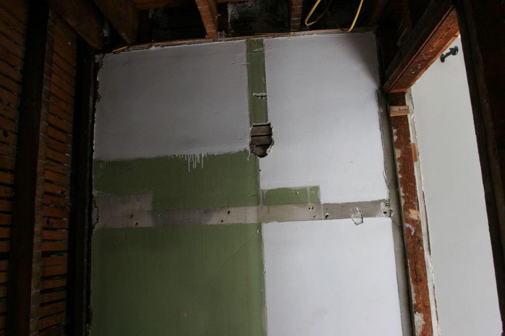 Evidence that the master shower was once merely a closet for the maid's room. The green area became a stall shower sometime along the way.
