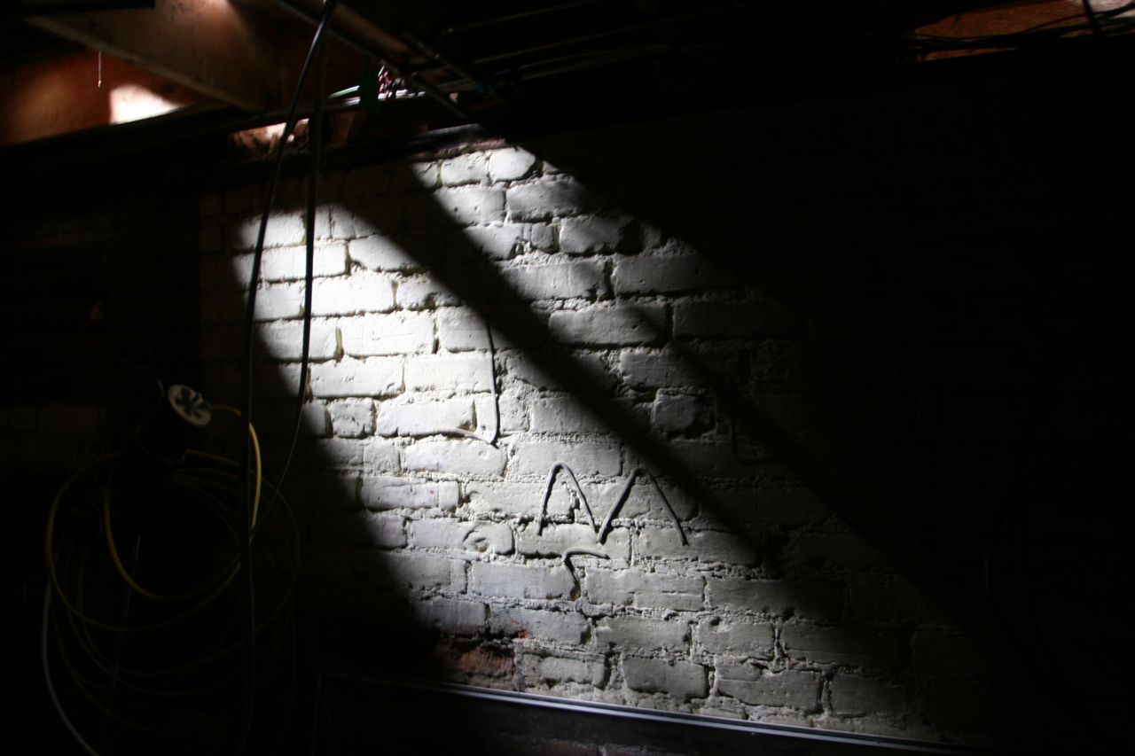 This is in the addition basement - aka: the secret basement. That's daylight streaming down from the kitchen above.