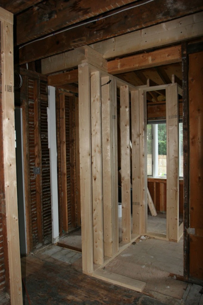 This new wall structure will separate the powder room from the kitchen and dining room.  That means no more bathroom IN the kitchen!