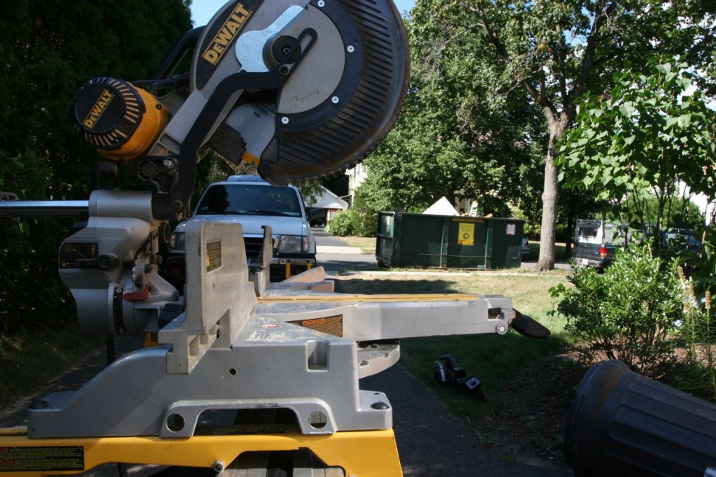 The chop saw in our make-shift workshop: the driveway!
