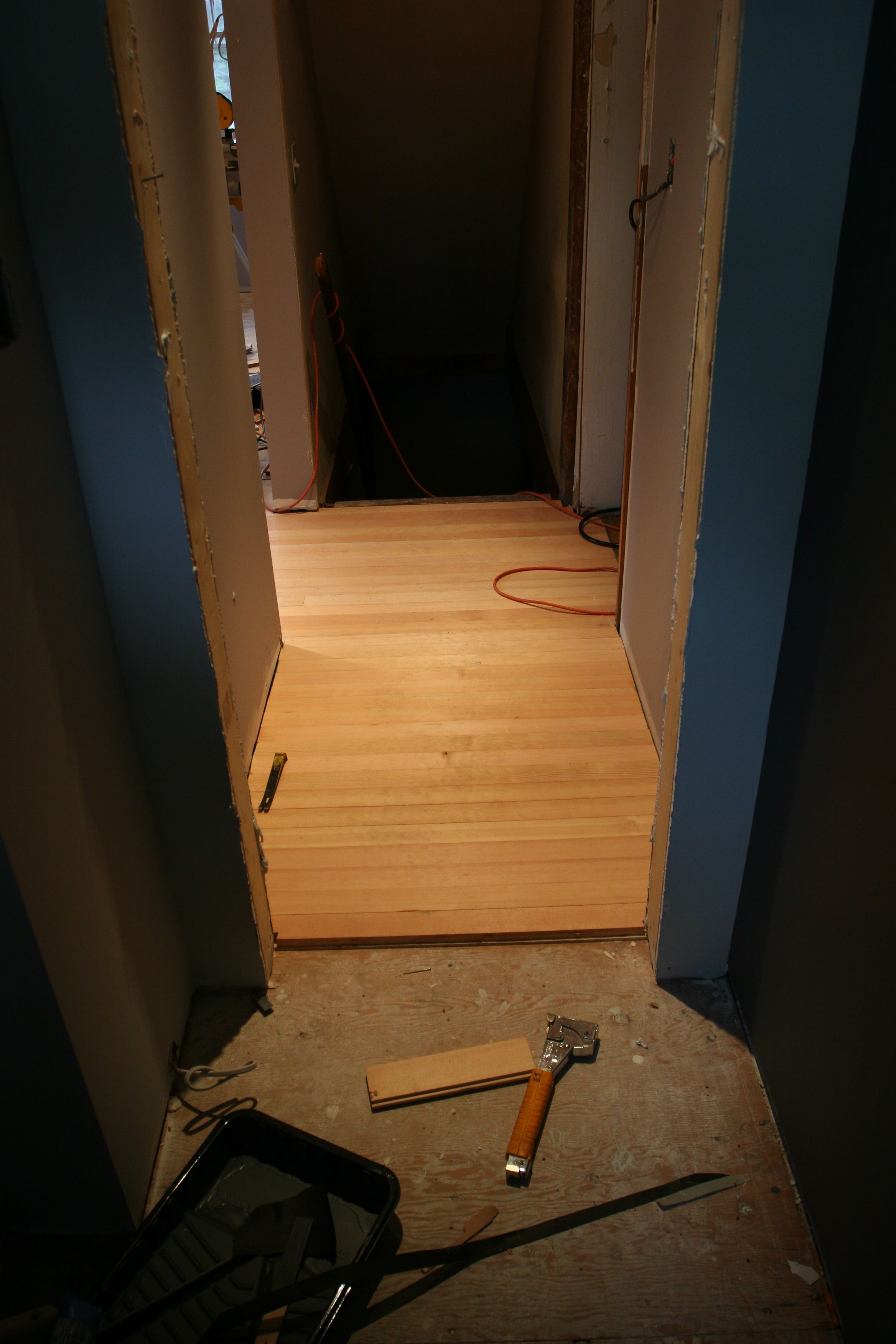 View from the powder room to the basement entrance.