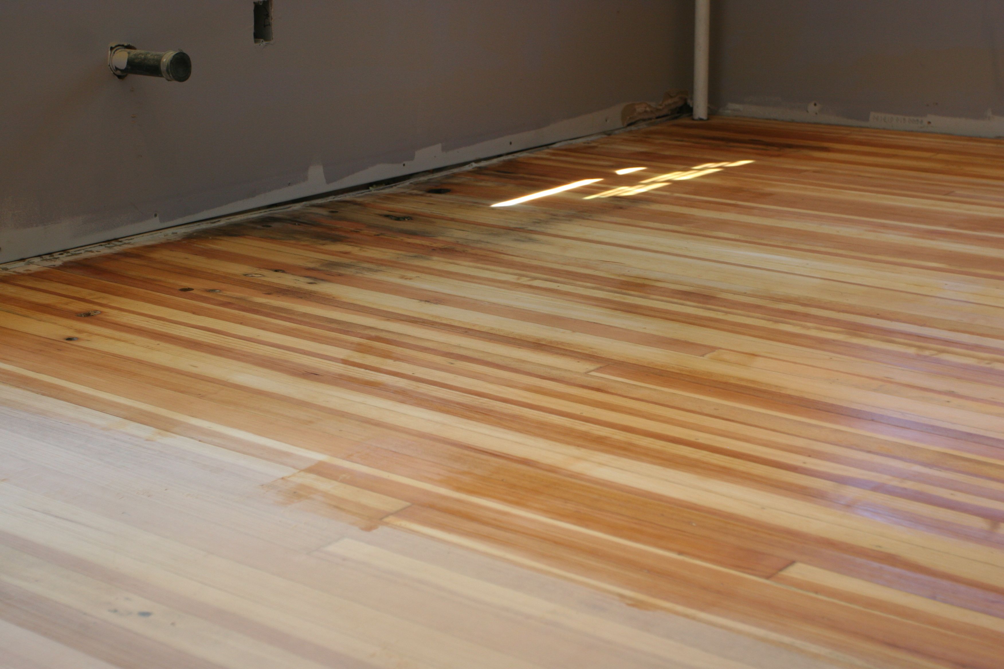 Older floor was denser than the younger floor, so it needed some special preparation to make the stain take evenly.