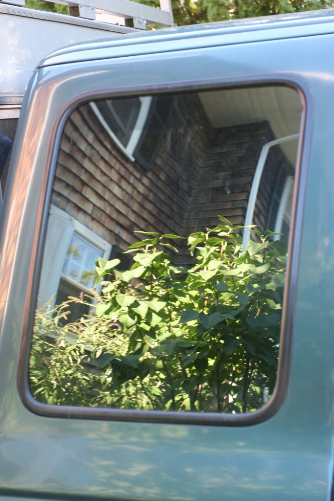 Our house in Eric's truck's window.