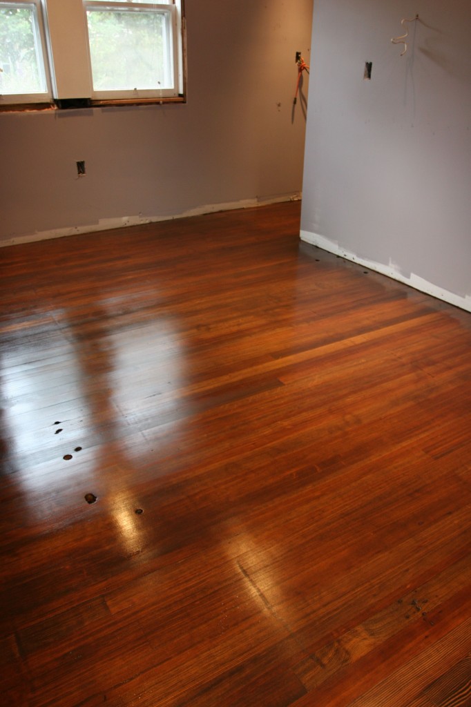 Gorgeous and glossy. The matte finish isn't as strong - it'll dull to a lovely well-worn floor over time naturally.