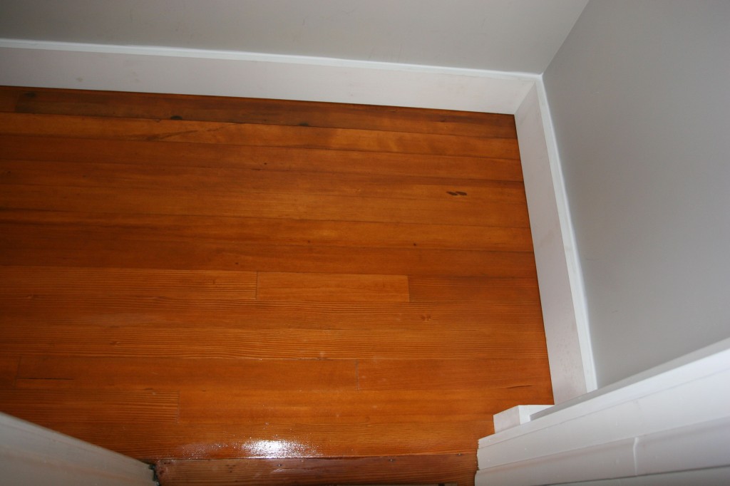 Closet floor with first sealer coat, and finish trim! Looks original! LOVE!