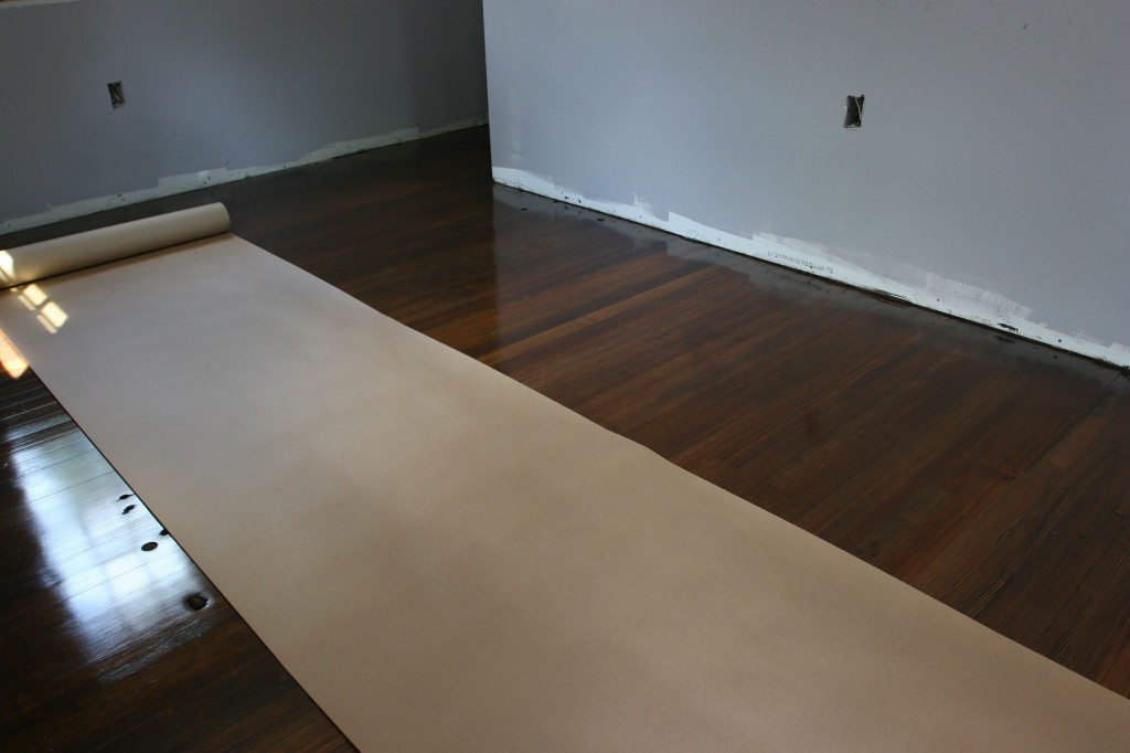 Rosin paper going over the floors for protection. We got to walk on the floors again!
