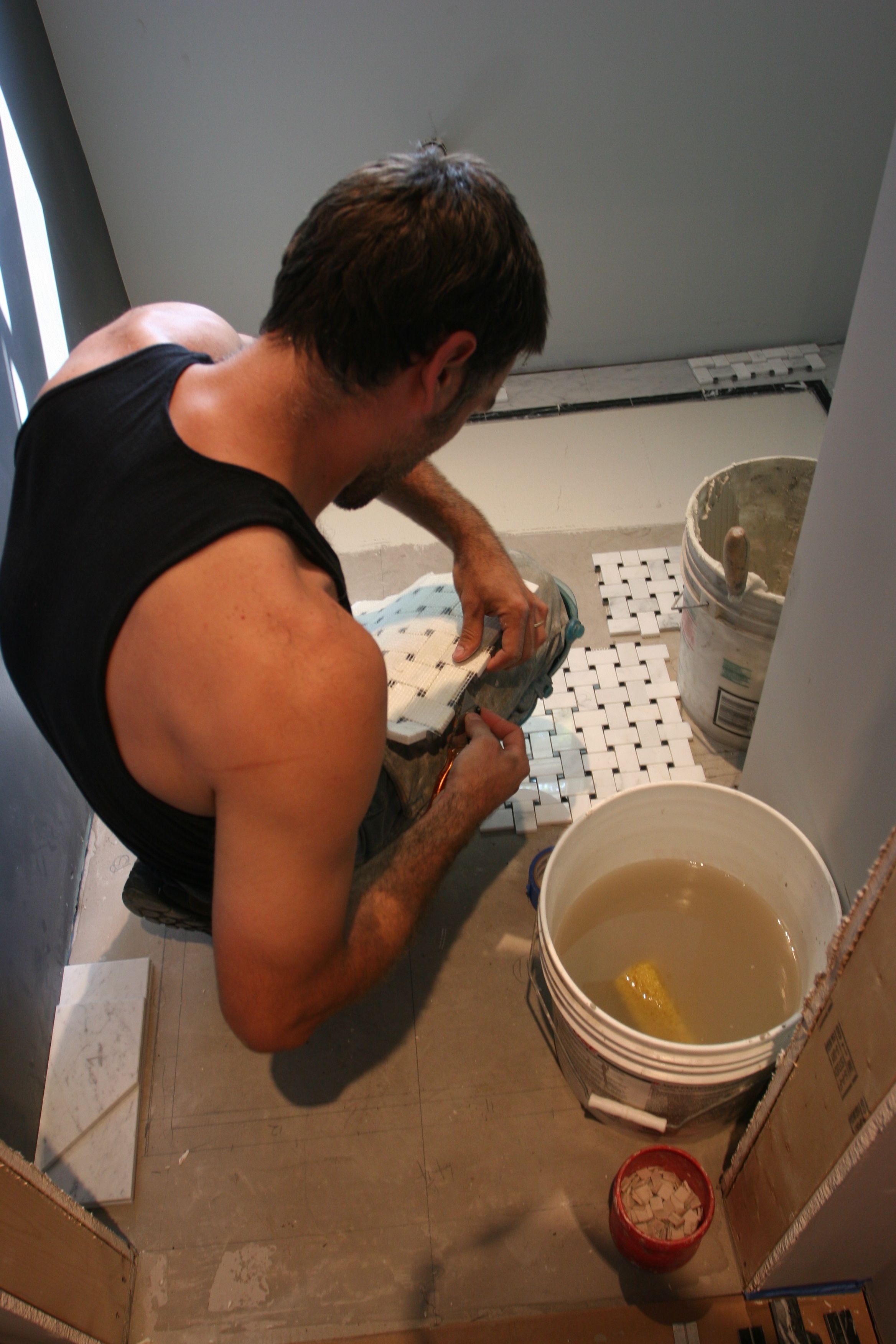 After any adjustments to the amount of thin-set were made, the tile could be laid into place.