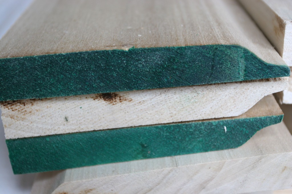 Still don't know what the green paint means. This is trim stock for the windows and doors.