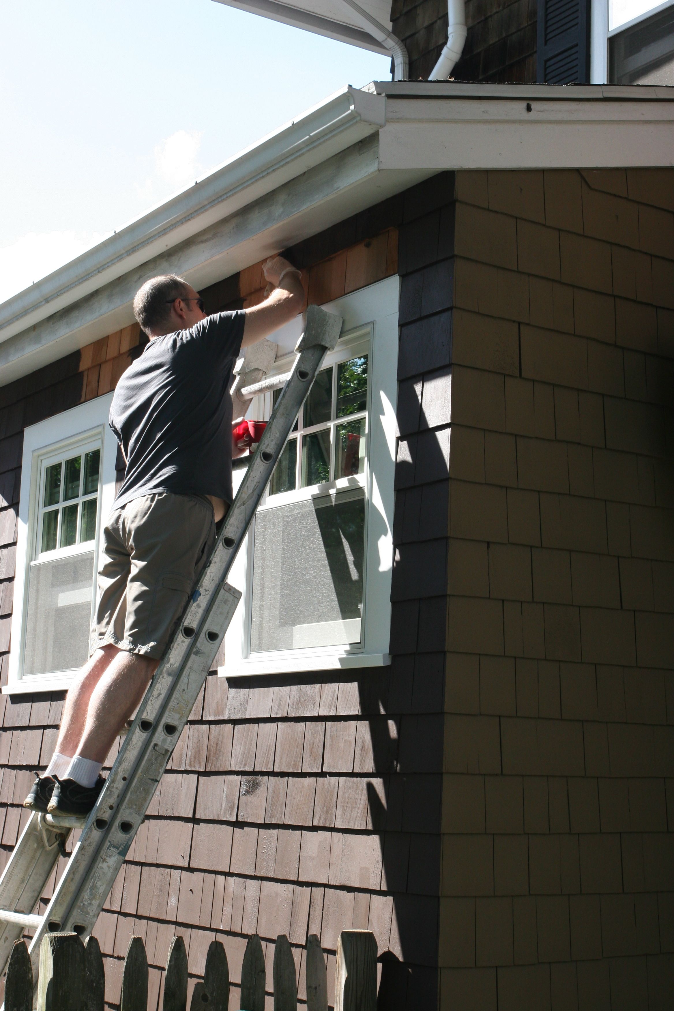 I couldn't reach some of the super high shingles, so mainly Jeff did those. It was a tiny bit scary up on that ladder.