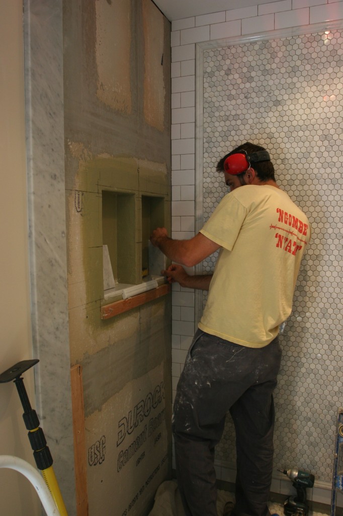 Caleb tackling the niches. He had to make the edges of the picture molding look finished by hand polishing them and grinding out the machine cut marks. Skill, my friends. Skill.