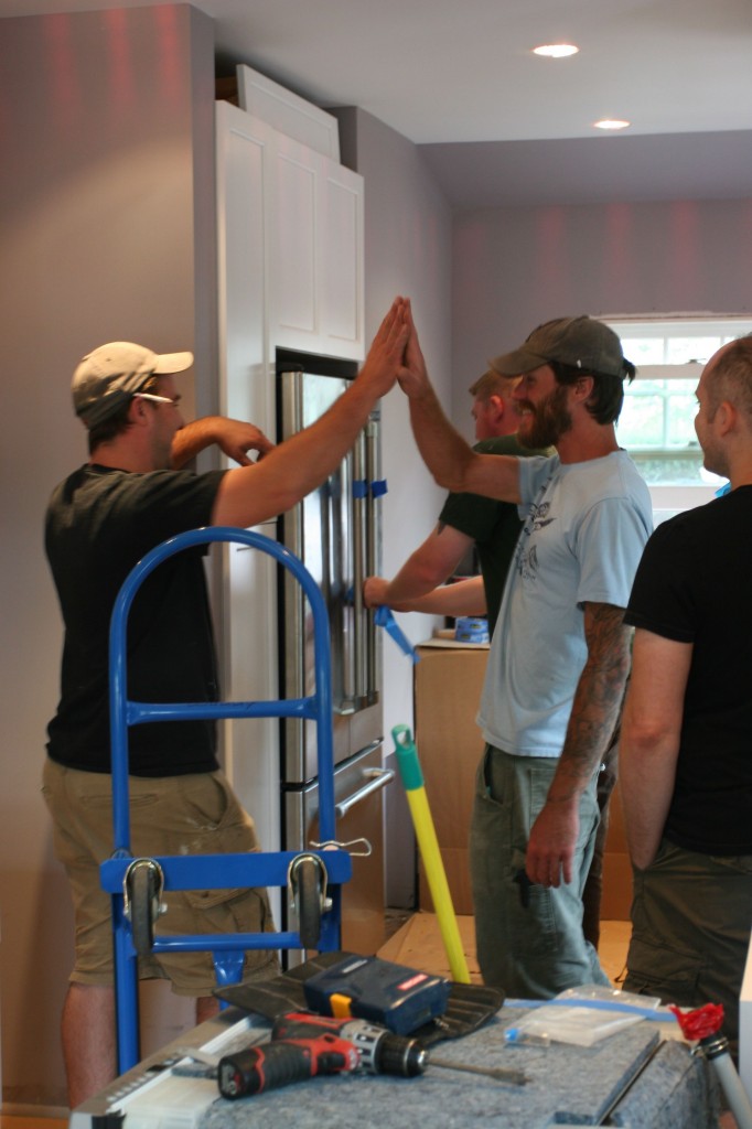 This was a real high-five. The refrigerator fit exactly. PHEW!! (Good job, dudes! High fives all around!)