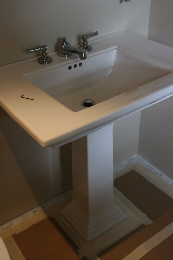 Our master sink - we searched high and low for a sink that would give us the feeling of counter space, but wouldn't take up floor or visual space.