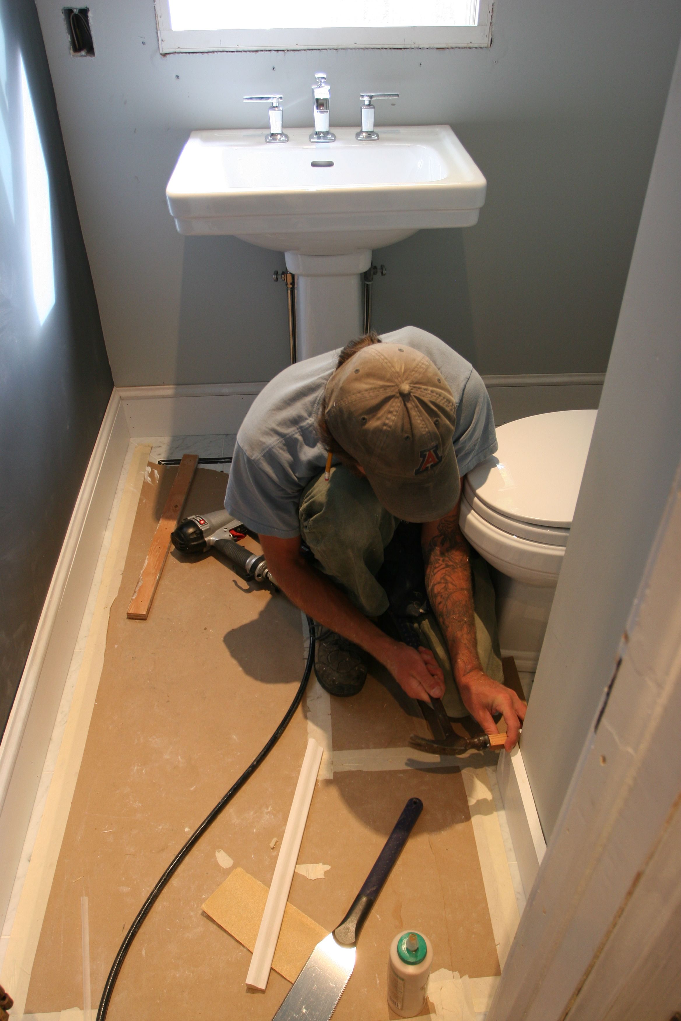 Eric dry-fitting his baseboard pieces. Everyone who's anyone does the dry-fit. It's all the rage.