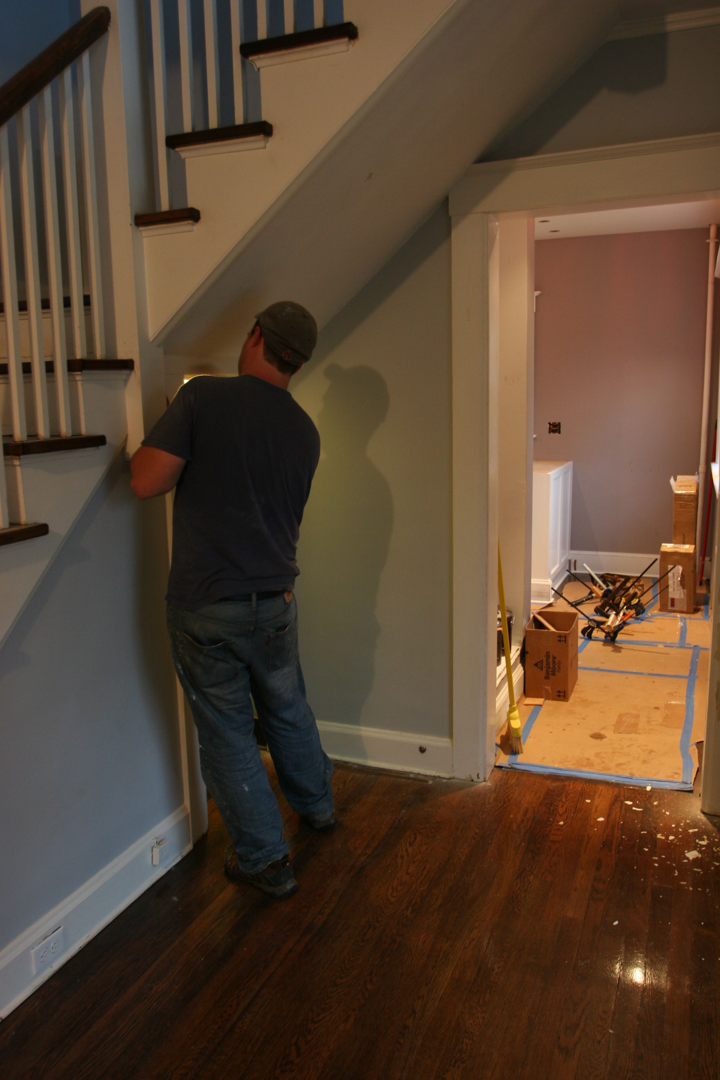 Dave sanding away at the trim. I dug his shadow on the wall.