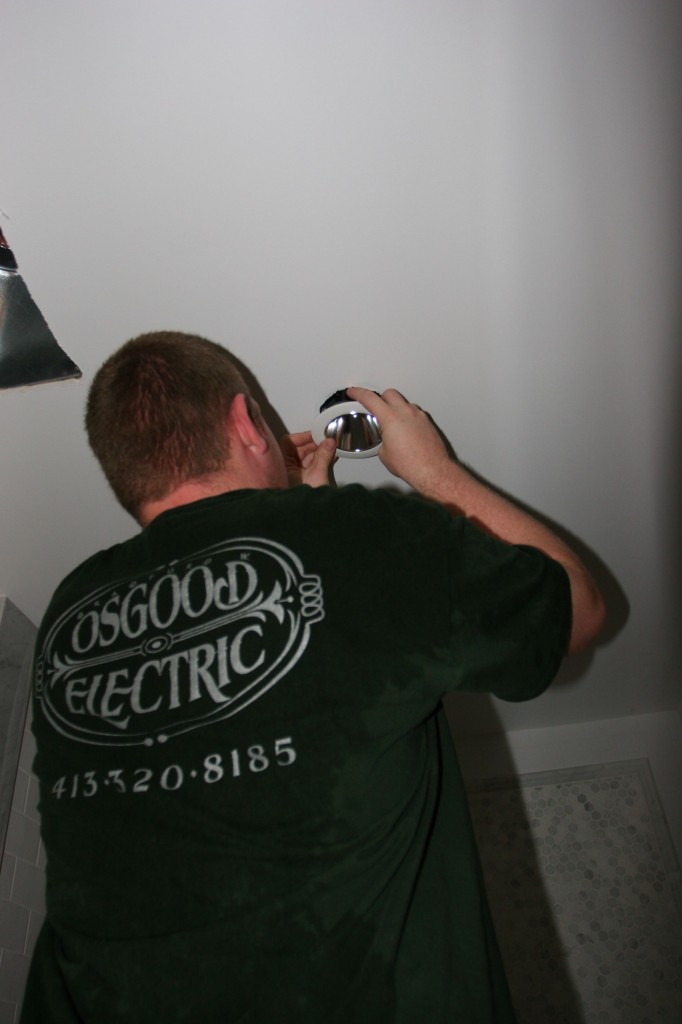 Brad trimming out the master shower light.