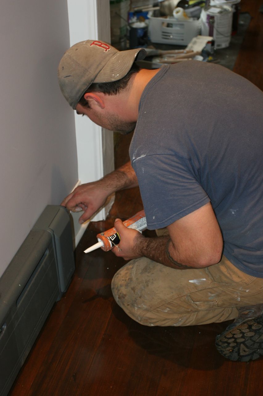 Dave finishing up the baseboard trim.