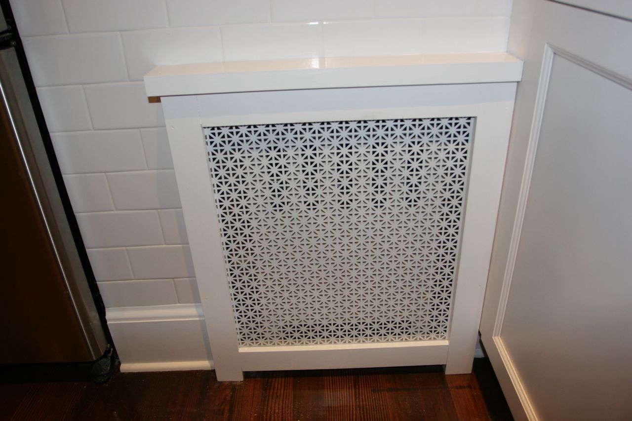Tile: fixed! Radiator cover: adorable! I'm telling you, this is the stuff that makes the room come alive. L.O.V.E.