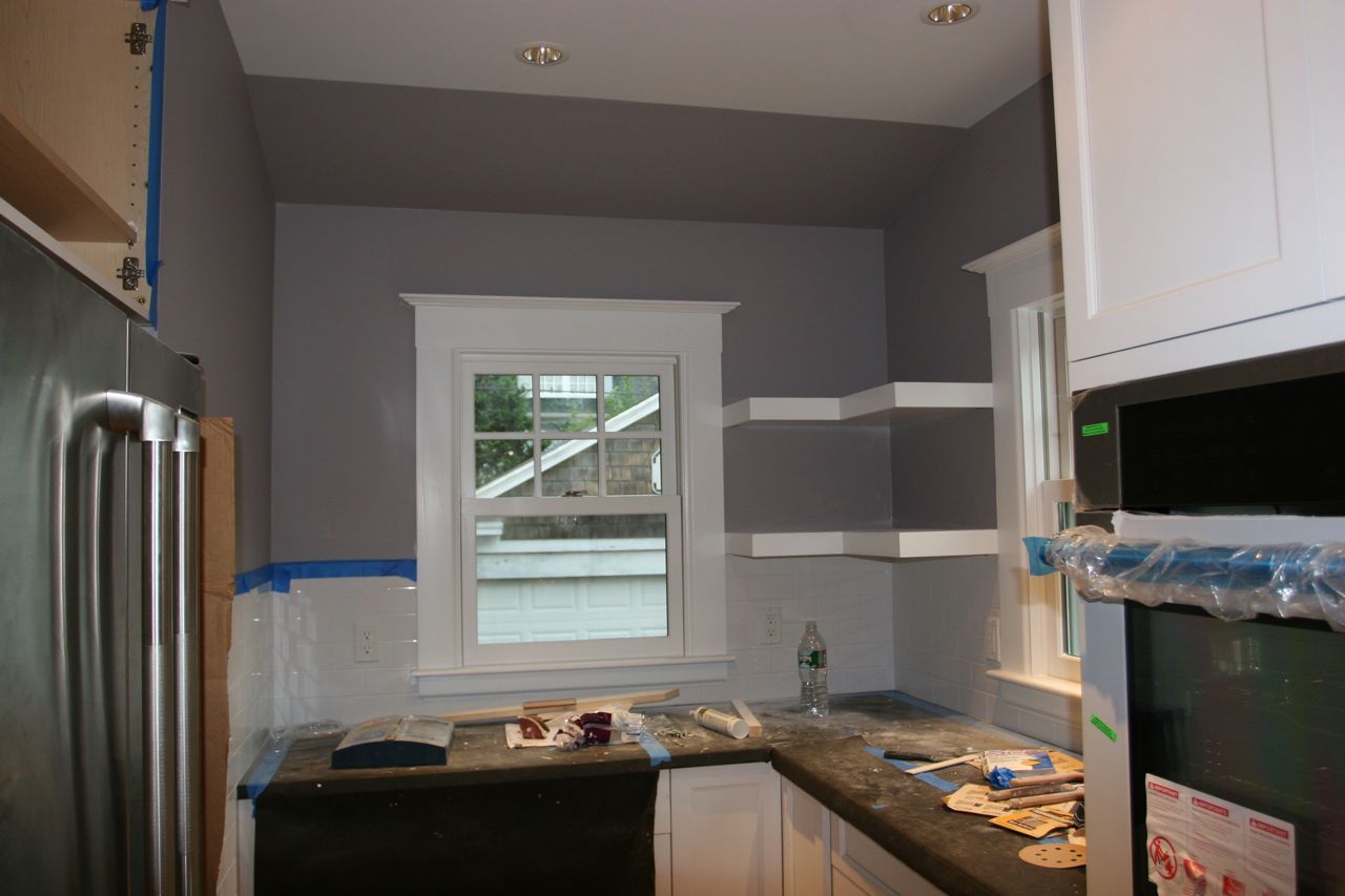 Wall: painted. Window trim: painted. Shelves: painted. Tile: sealed. Countertops: installed. So, so close.