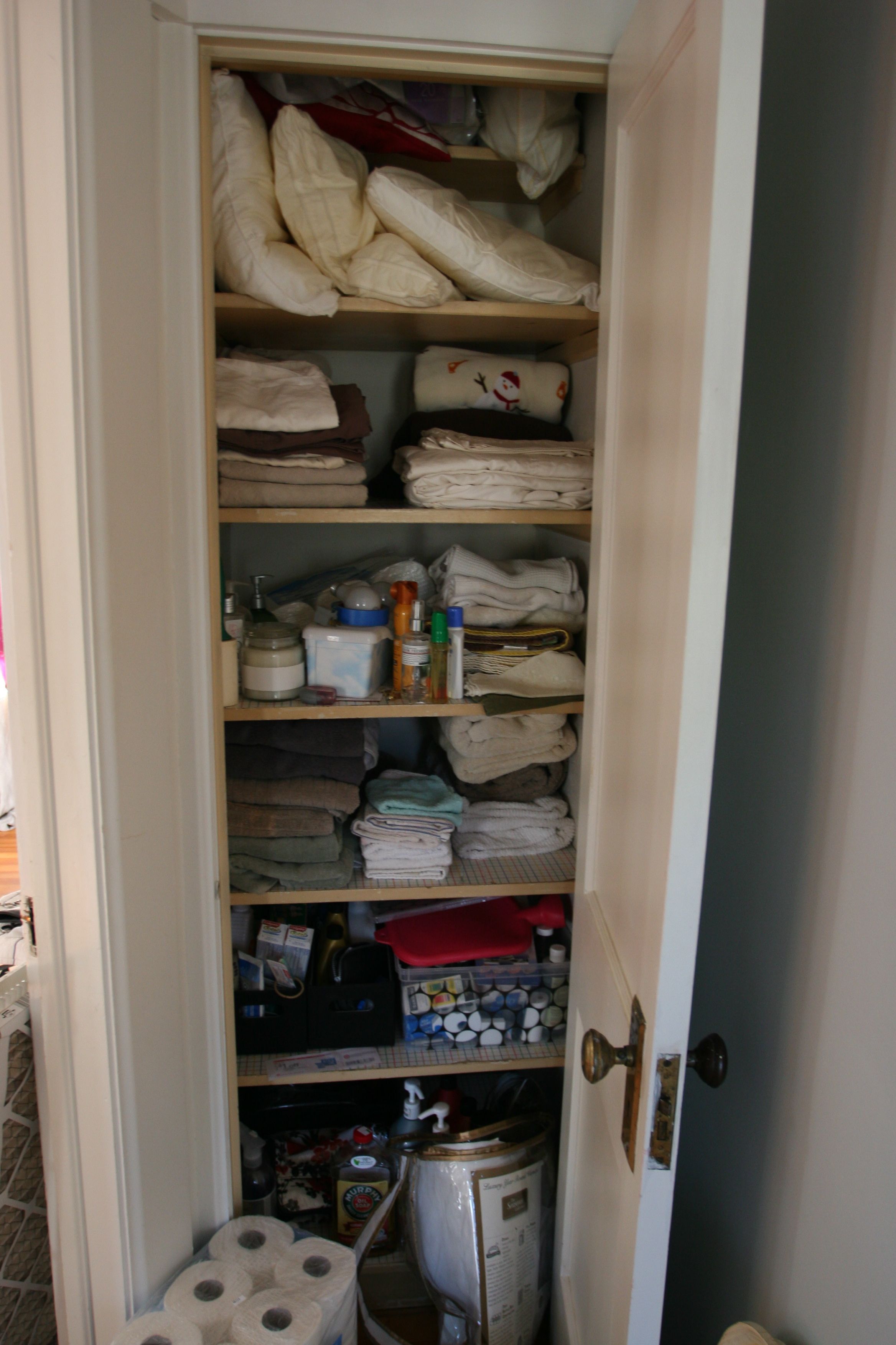 Our divine linen closet. Most of the closets haven't been sorted out after our summer of moving from room to room.