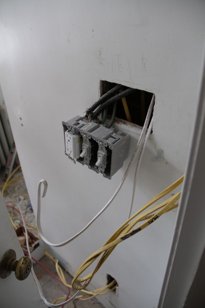 See those thick, nasty looking wires attached to that new looking box? Yeah, knob and tube. But since Brad already killed those circuits, that outlet hadn't worked since late October.