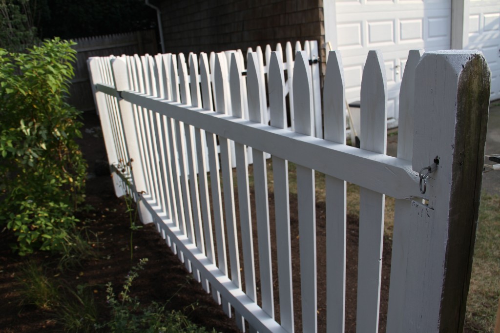 Classic white picket fence.