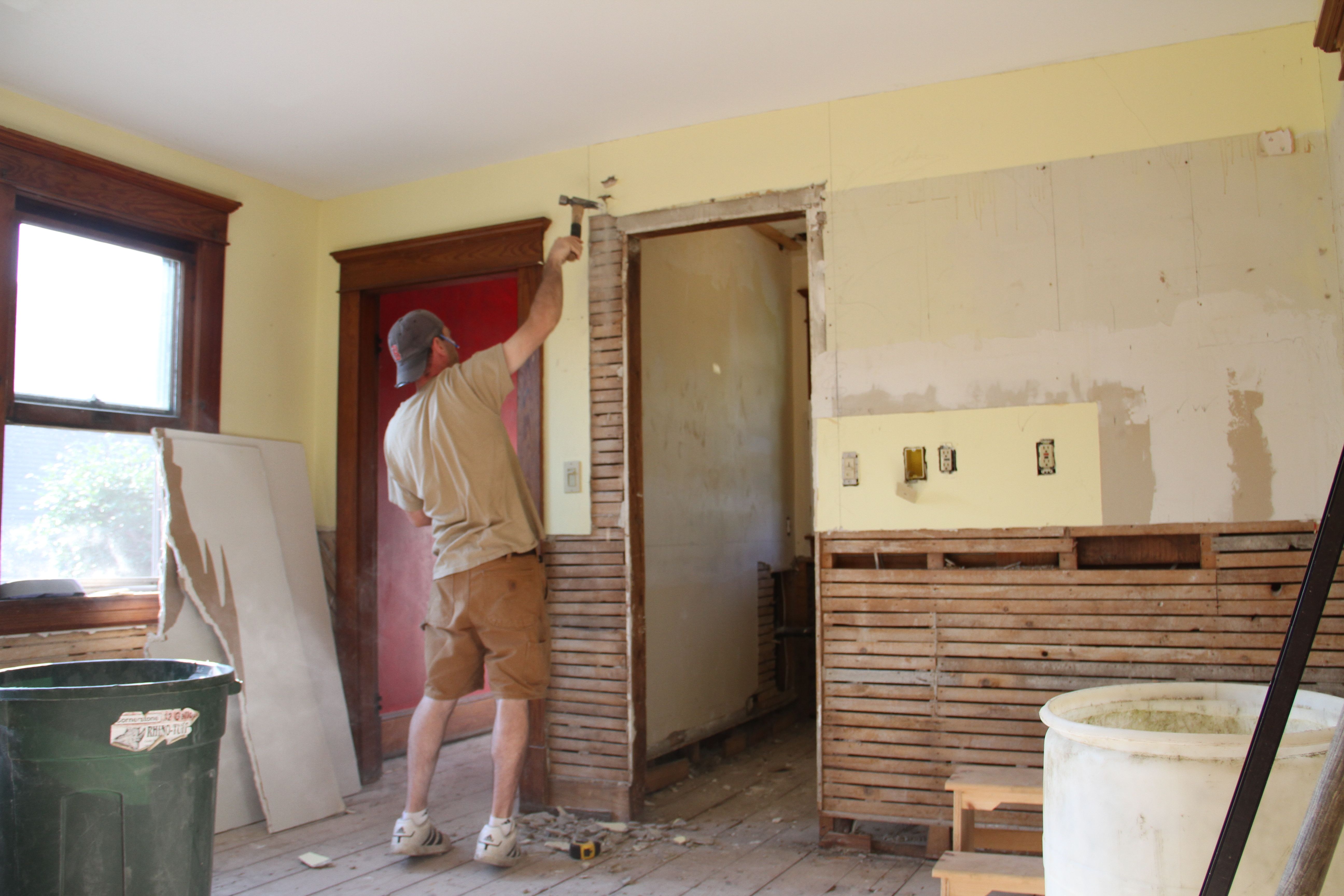 Jonas began the day by continuing with deconstructing the former opening to the powder room.