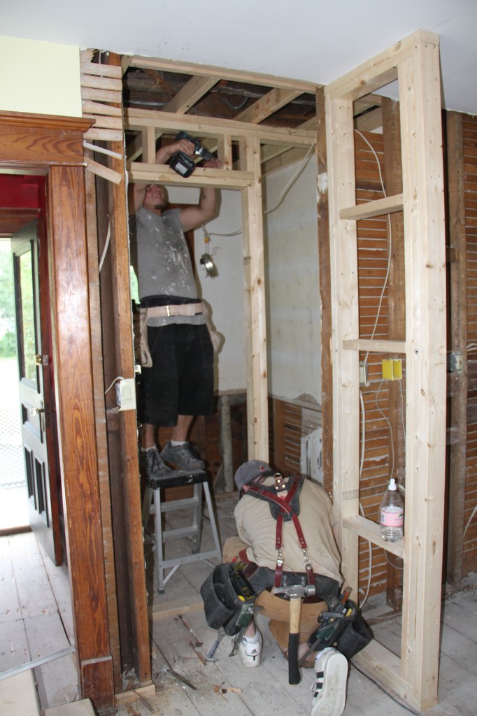 Door header getting installed. More demo happened after this to make way for the plumbers. Let's hope it was enough.