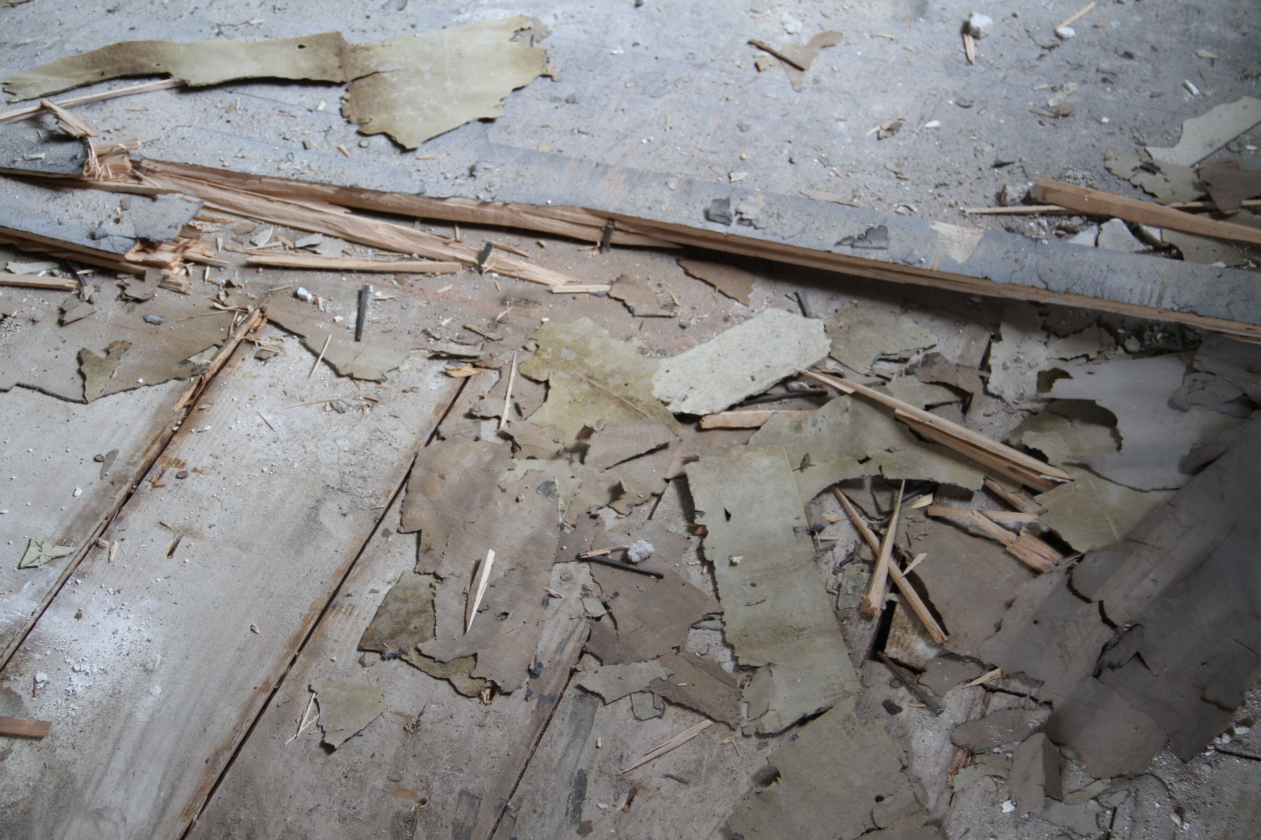 So up the flooring went. Paper debris, nails, splinters, dust - everything was flying around in there.