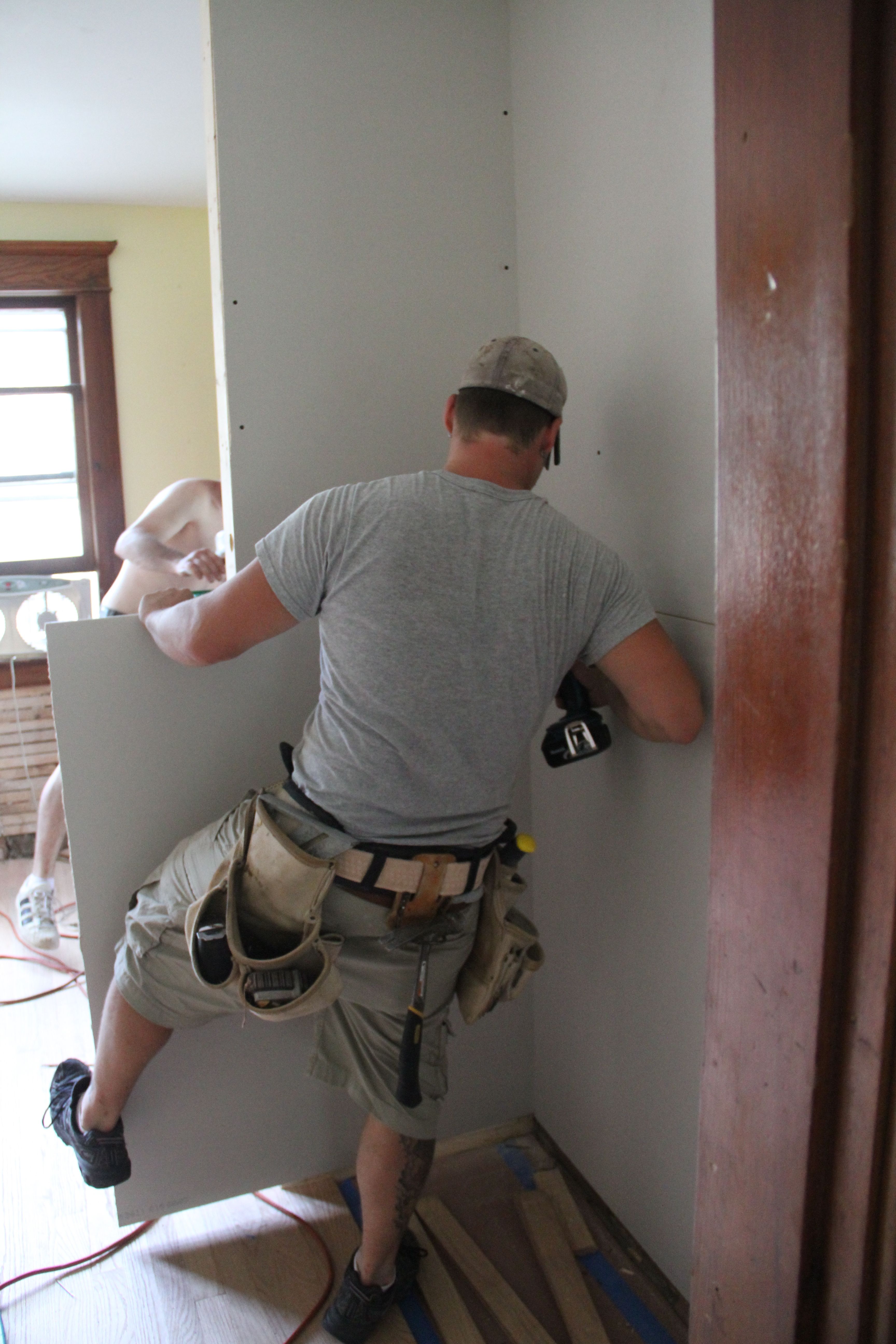 Sheetrock installation requires your entire body. Don't let anyone tell you different.