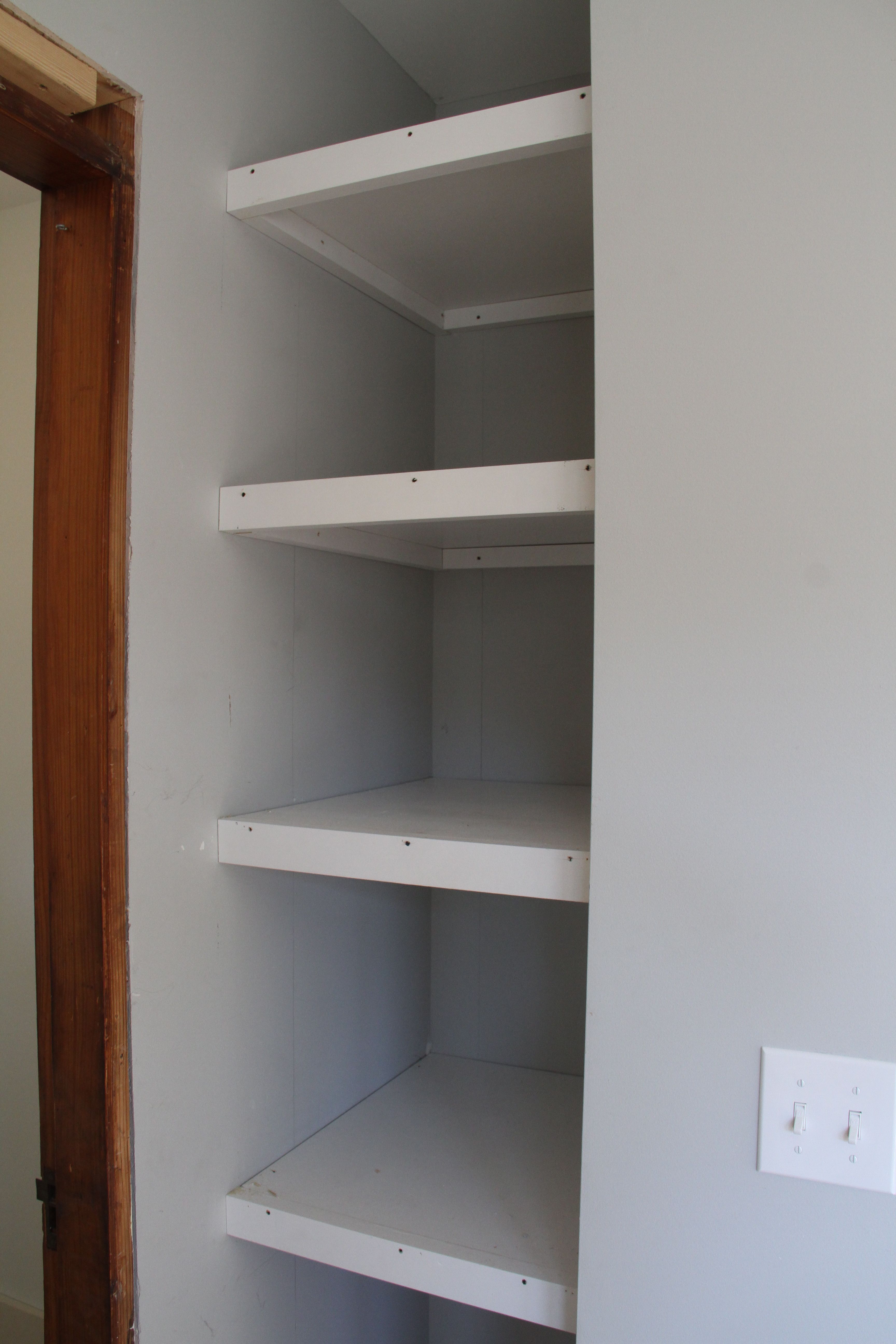 Built-in pantry, formerly a portion of the powder room. We took that space back because the kitchen needed it.