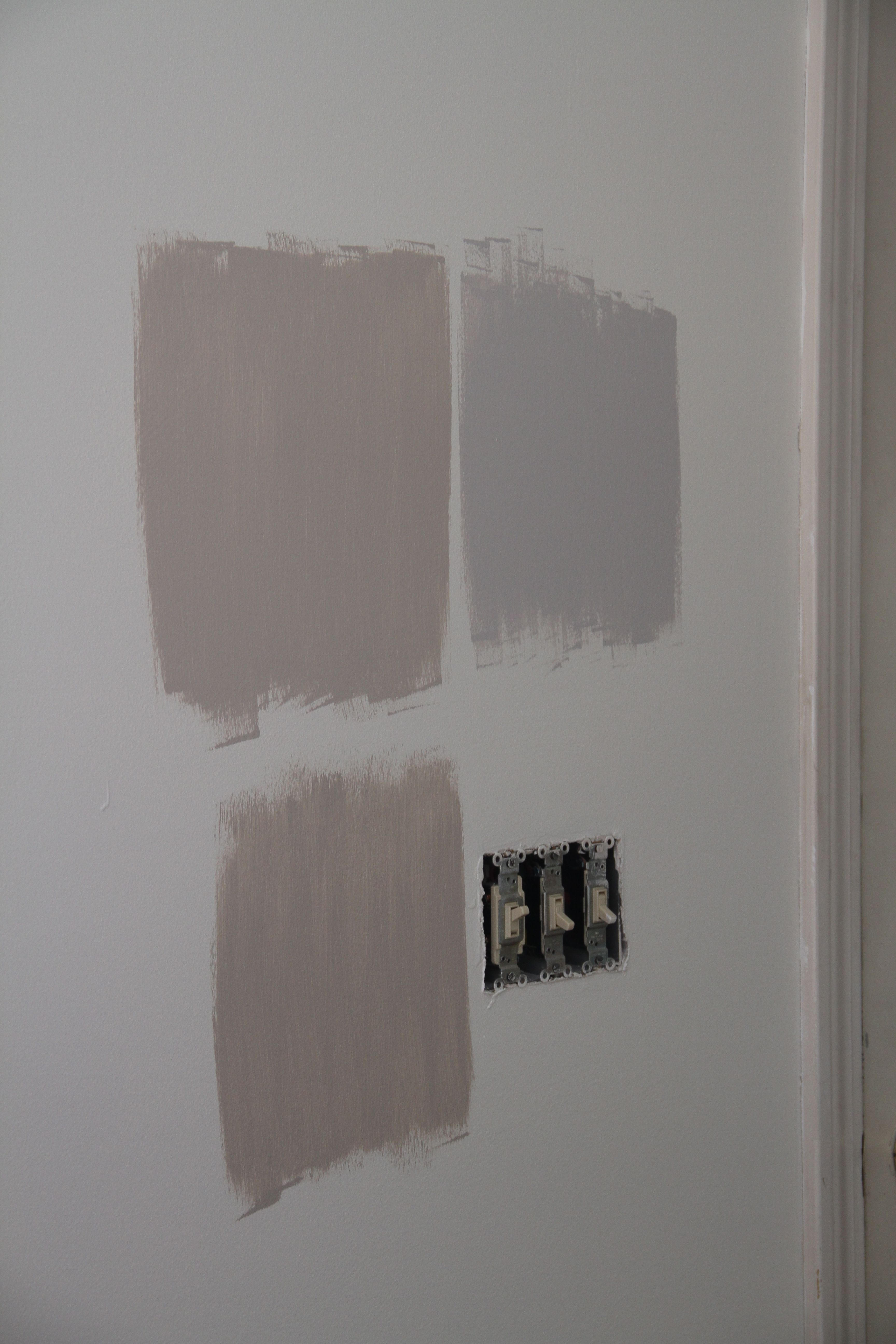 Condo: paint colors were sampled. We arrived at the grey-ish one on the upper right for the living space.