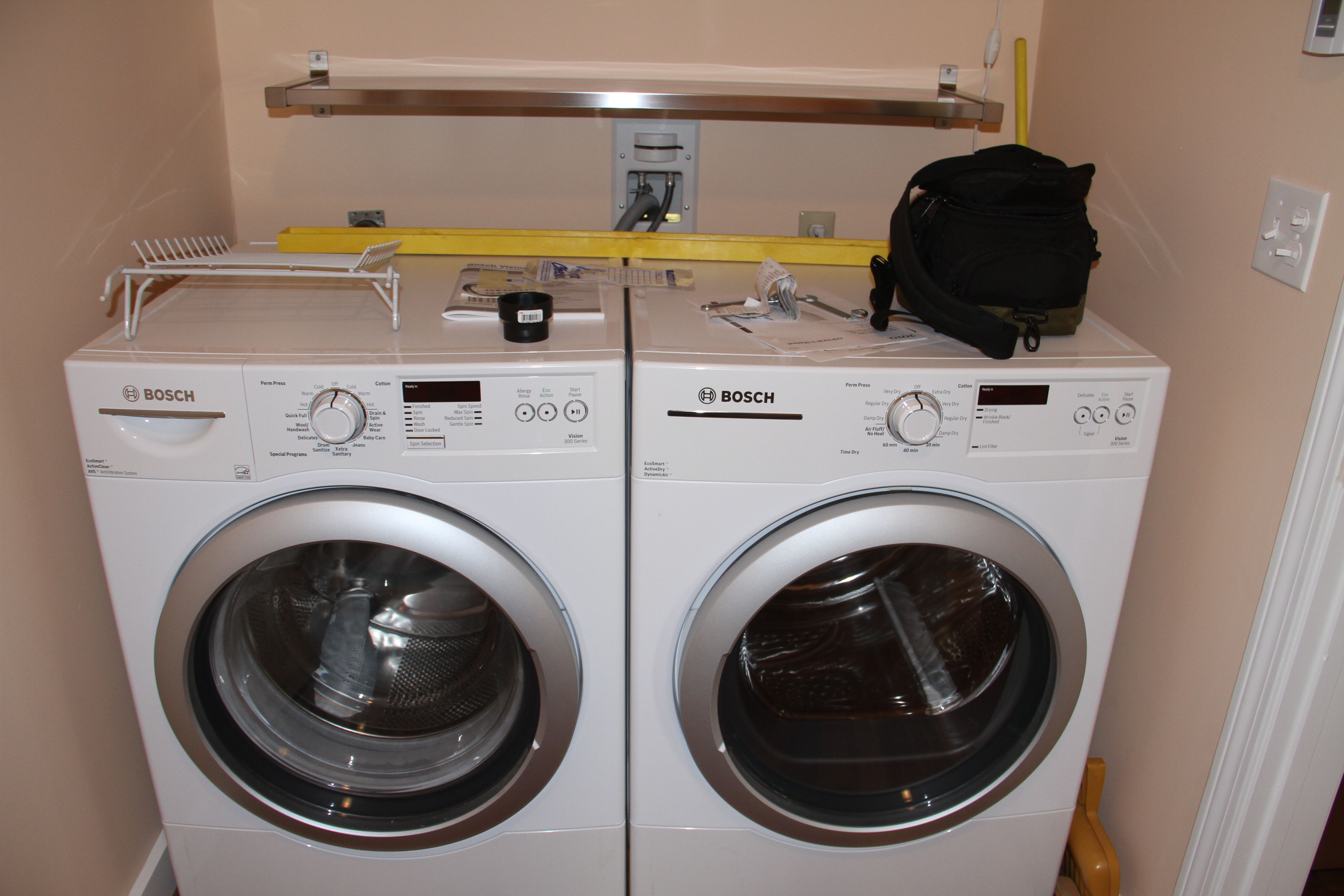 AFTER: Laundry facilities, no leaks, no COINS! My mom has used coin-op for, I don't know, ever? Now, she has the luxury of doing her wash whenever she likes, sans roll of quarters.