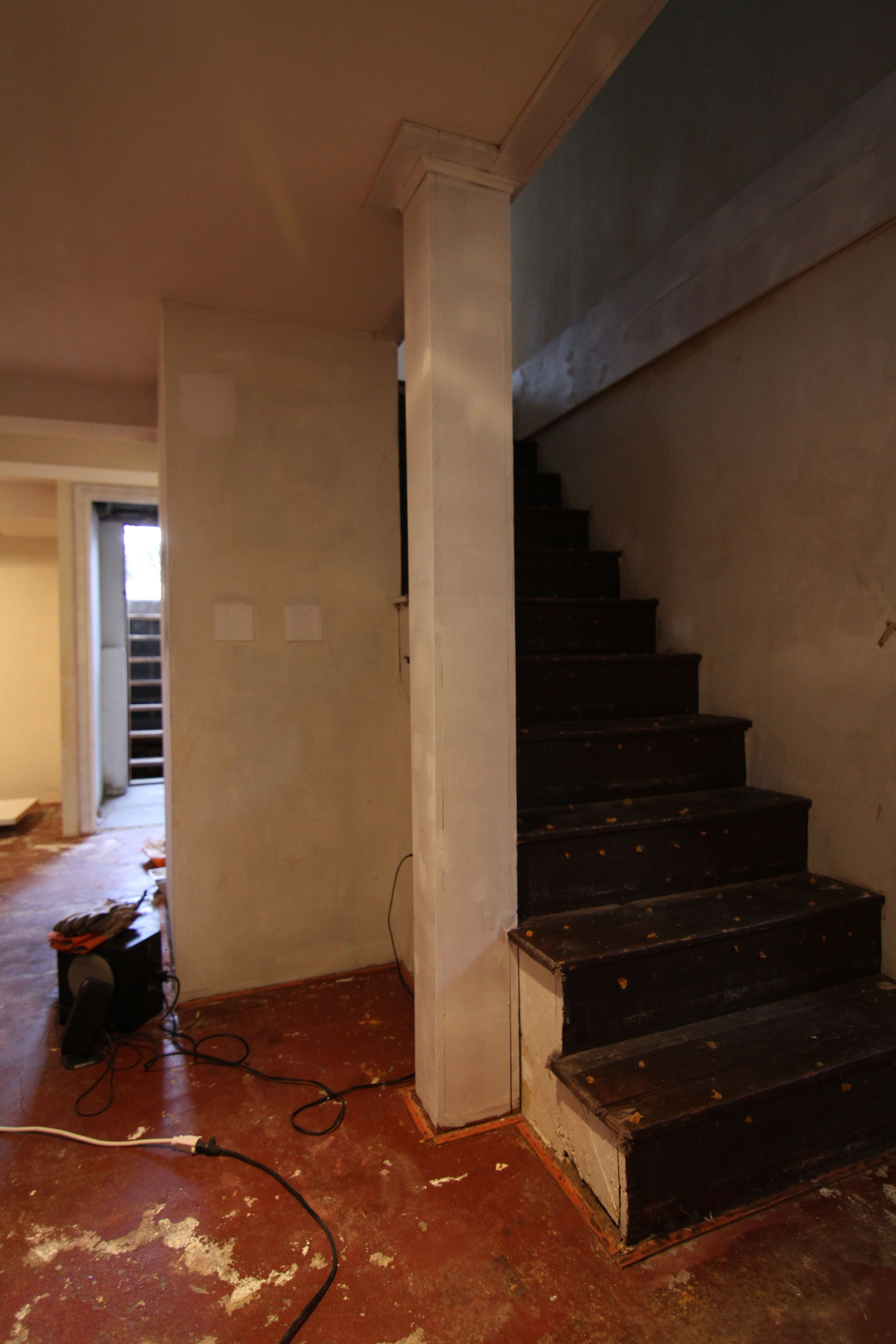 The original staircase color was dark brown. I felt instantly as if the stain color we chose for the main level was in keeping with this original spirit of the house.