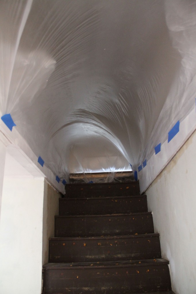 This cool effect came from wind pushing up the stairwell into the main part of the house. Luckily my plastic-job did the trick and not a drop of paint entered our beautiful kitchen.