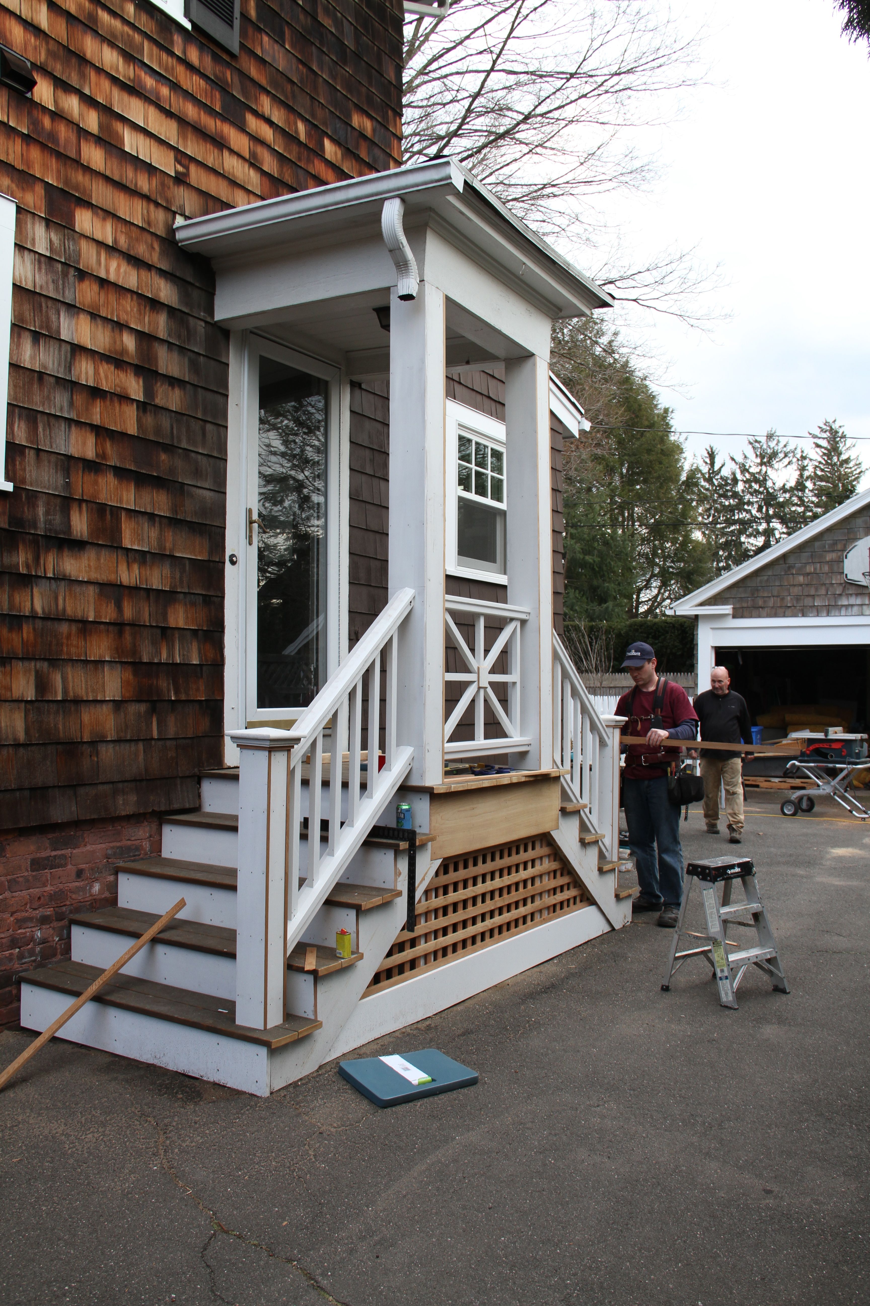 DURING: The entryway - which obviously still needs exterior paint, etc., to be finished - welcoming visitors to step inside.