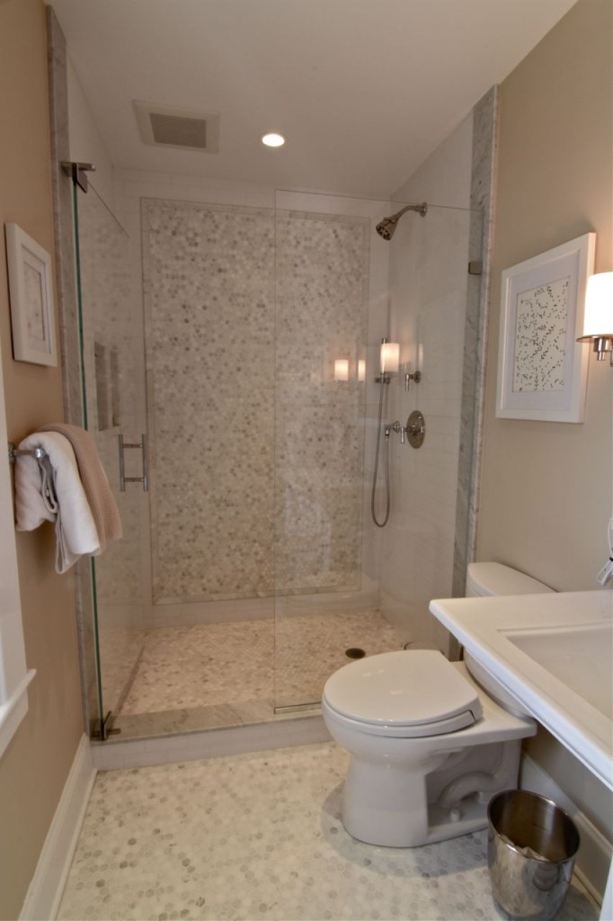 Formerly the maid's bathroom, the room now features modern amenities such as recessed lighting, dimmer switches and a whisper-quiet fan for ventilation.