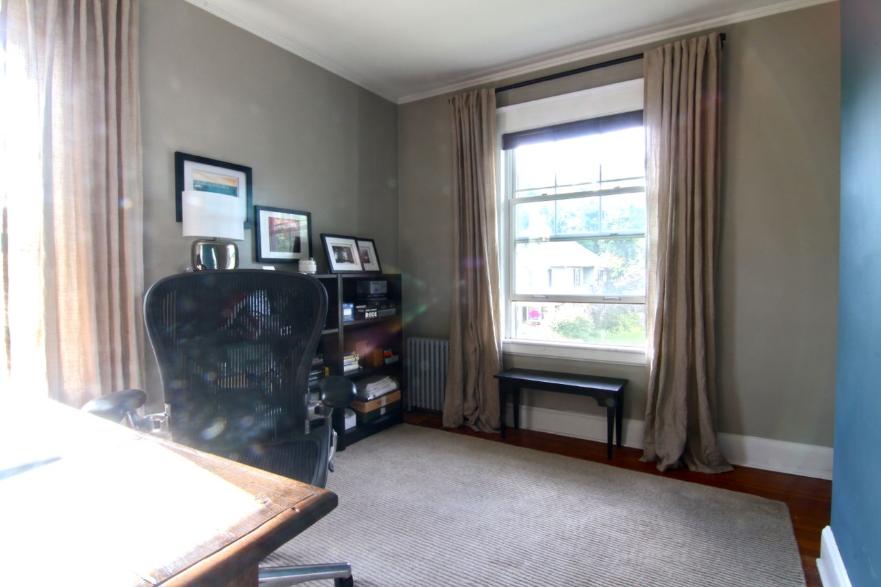 And, with two large windows, the space is inviting, and roomier than the maid ever had in her day. (Sorry for the hideously filthy lens - that western sun just blinded me to it while shooting.)