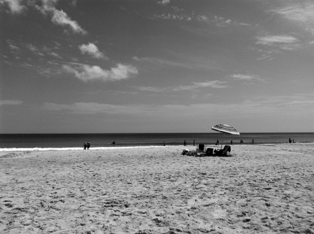 Before the beach completely filled up, and as people were setting up their gear, I snapped a few pictures that felt like another time.