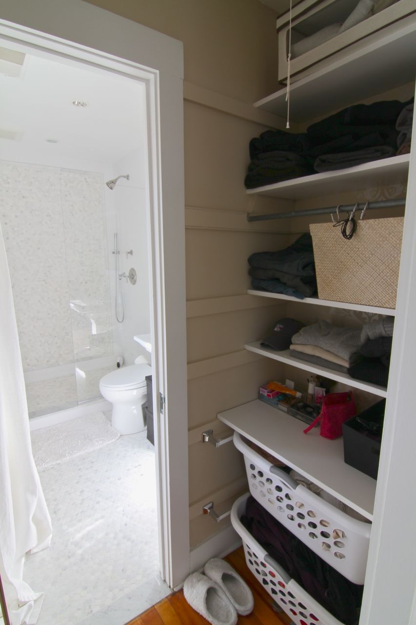 AFTER: We've since added in some of the original hooks from the second master closet renovation, giving us even more efficient use of this clever little space.