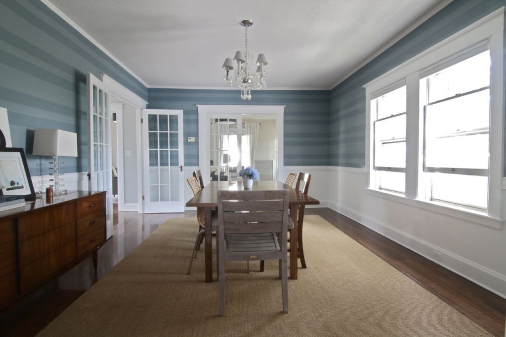 This dining room went through several paint colors before we arrived at this custom treatment. It's not wallpaper, just paint, painstakingly measured, taped off, and applied. Labor of love, and one of the earliest tone-setting design elements we arrived at. Still love it.