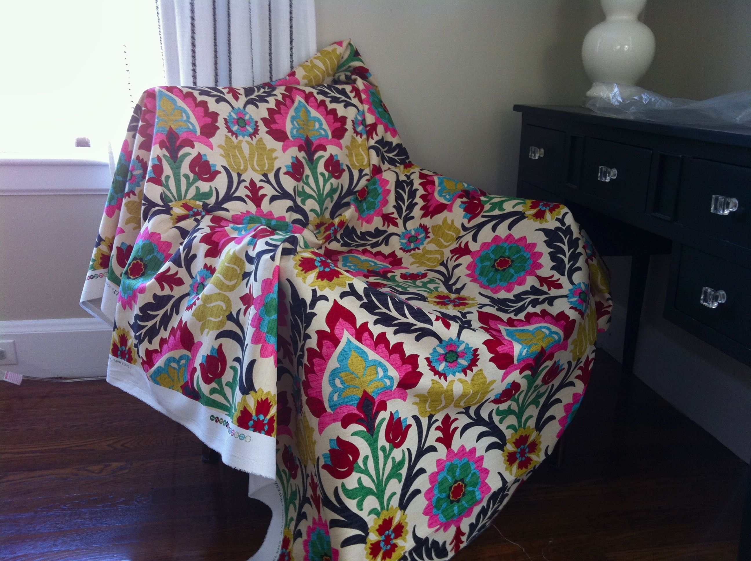 BEFORE: I draped the fabric on the chair when we got it to try to visualize the final product.