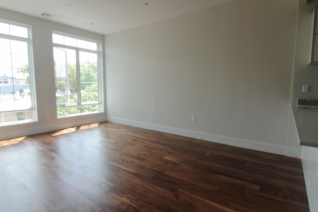 BEFORE: The living/dining room, now with light! And a breeze! (The adjacent kitchen was too full of weird cleaning supplies to photograph.) 